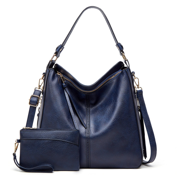 Bolso de cuero con protección antirrobo + Monedero Pouch GRATIS