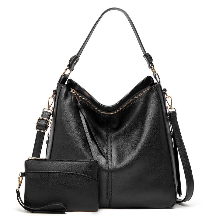 Bolso de cuero con protección antirrobo + Monedero Pouch GRATIS