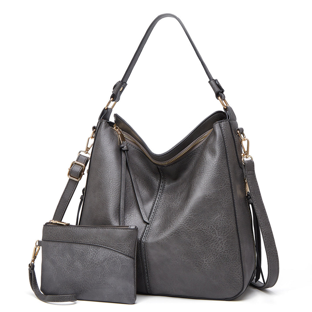 Bolso de cuero con protección antirrobo + Monedero Pouch GRATIS